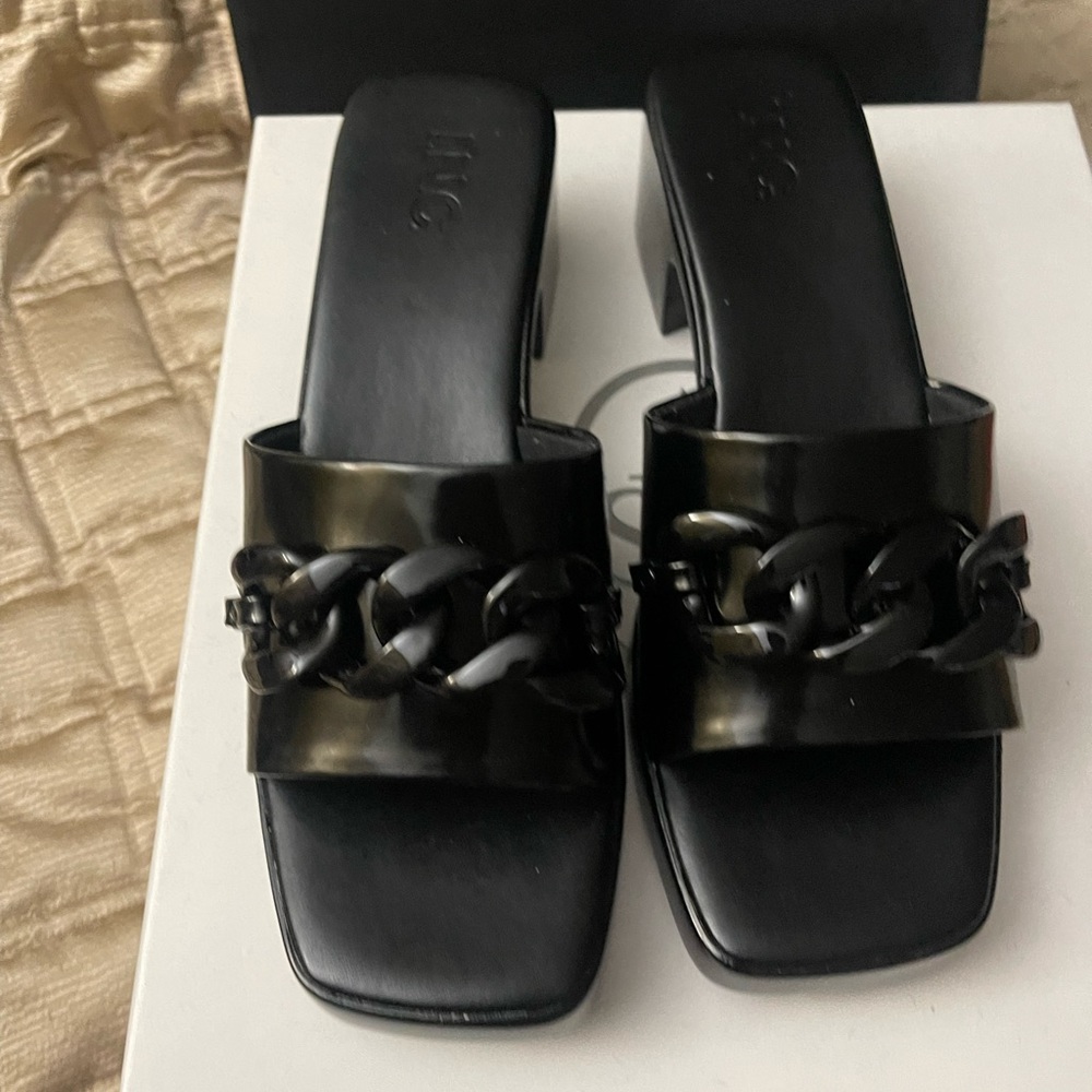Black Sandal by Inc with a black chain